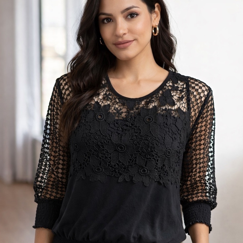 Sakura top size XS black with floral mesh around the shoulder and collar